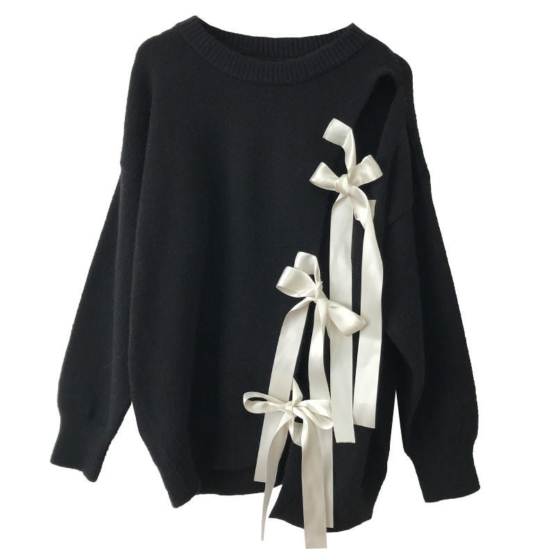 Black sweater with white ribbons on a white background